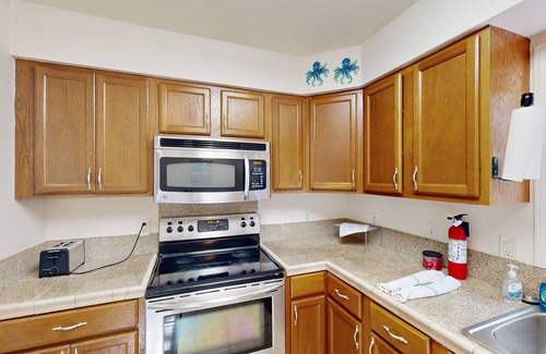 Pass Christian Casa | Charming centrally located fish camp w/ dock and outside area
