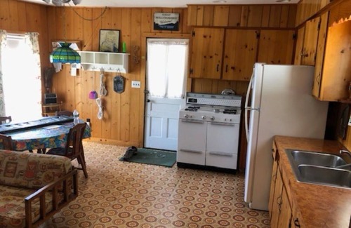Westmore Cabina | Charming cottage on Lake Willoughby w/ sun porch, private deck and dock.
