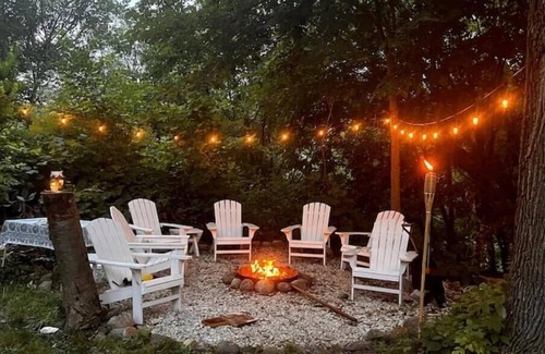 Payne - Phalen Casa | Charming Cottage with Hot Tub, Fire Pit, & Wooded Backyard