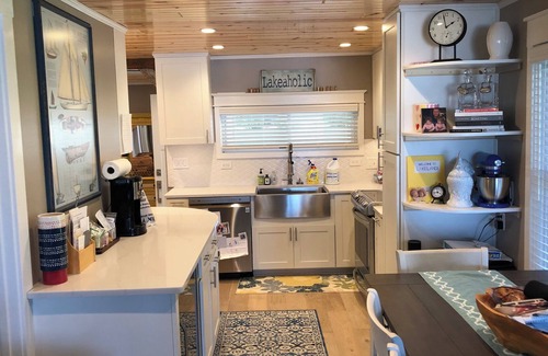 Rapid City Cabaña | Charming & Cozy Torch Lake Waterfront Cottage