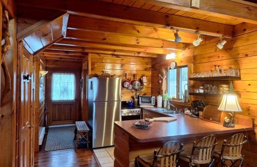 New Bedford Casa | Charming Creekside Log Cabin with Wood Burning Stove Overlooking the Neshannock Creek, Western PA
