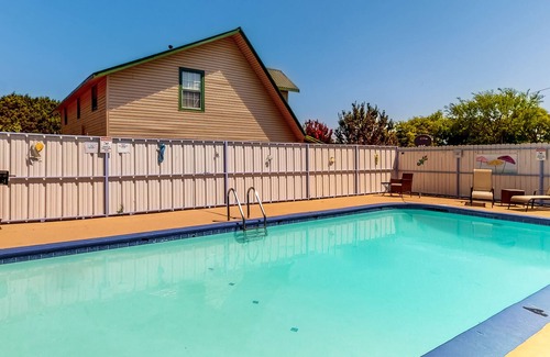 Laguna Park Casa | Charming dog-friendly apartment with patio, W/D, & shared pool, hot tub