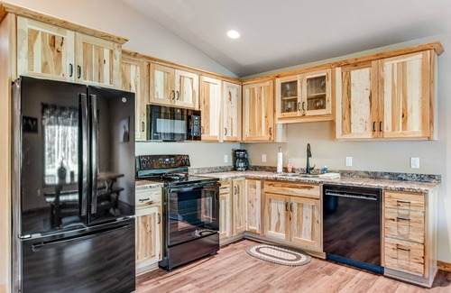 Conover Casa | Charming dog-friendly cabin with hot tub, fireplace, patio, grill, & central AC