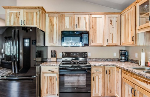 Conover Casa | Charming dog-friendly cabin with hot tub, fireplace, patio, grill, & central AC