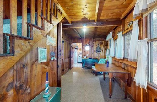 West Alton Cabaña | Charming dog-friendly lakefront cottage with private dock & community beach