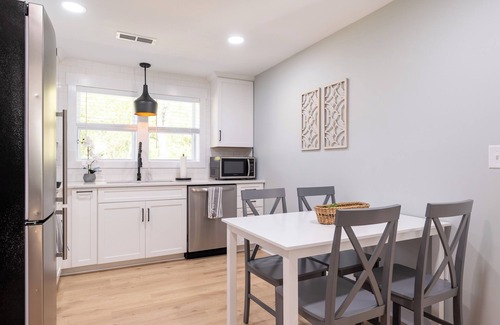 Blacksburg Casa | Charming entry and spacious back deck surrounded by nature, perfect for a peaceful getaway.