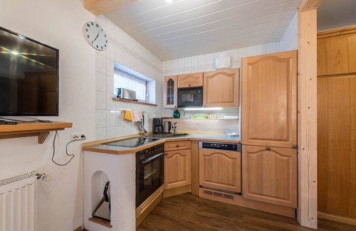 Ruhpolding Apartamento | Encantador apartamento vacacional Förchensee junto al lago con Wi-Fi, sauna y piscina