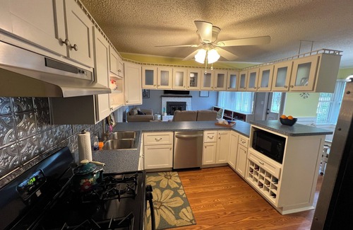 Northeast Pensacola Casa | Charming home near 1-10, WiFi, deck, close to everything, yard, pets, 65” TV.