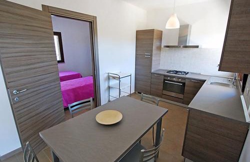 Sant'Anna Arresi Casa | Charming House in Is Potettus with Private Garden