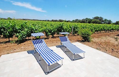 Sant'Anna Arresi Casa | Charming House in Is Potettus with Private Garden