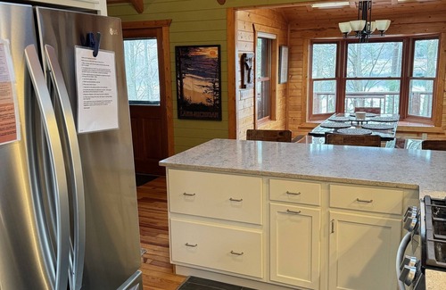 Traverse City Casa | Charming Log Cabin, Lake Views and Kayaking