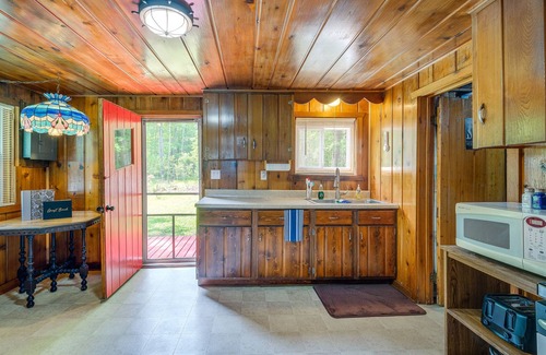 Herron Cabaña | Charming Michigan Cottage w/ Sunroom & Lake Access