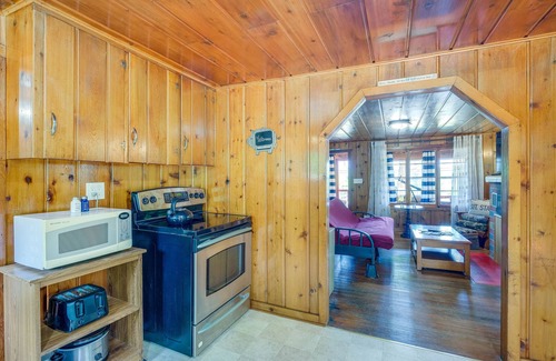 Herron Cabaña | Charming Michigan Cottage w/ Sunroom & Lake Access