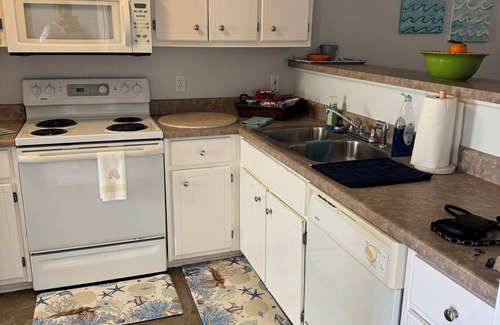 Bel Air Casa | Charming retreat across from Beach access 18 and steps to local attractions.
