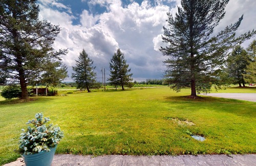 Branchport Casa | Charming retreat with private hot tub, fireplace, & furnished patio