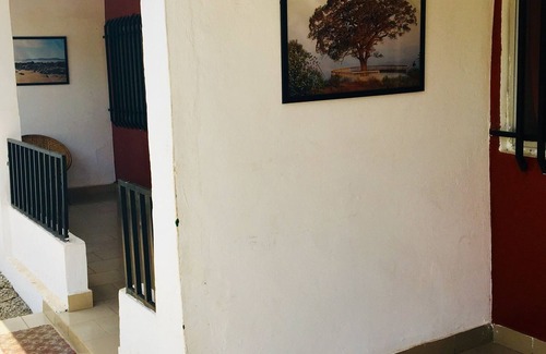 Conakry Casa | Encantadora habitación en nuestra casa de huéspedes.