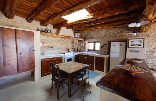 Formentera Casa | Casa con encanto, de piedra, vistas a Ibiza, 1,200 m2 de terreno privado