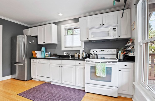 Columbia City Casa | Charming Sun Kissed Garden Home in Columbia City
