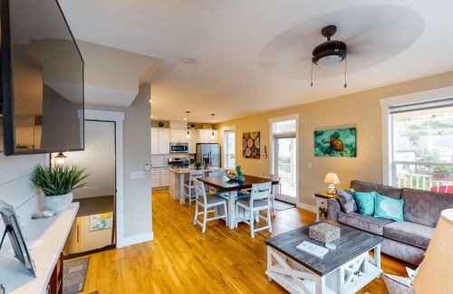 Olivia Beach Casa | Charming, three-story getaway w/ two cozy living areas - walk to the beach