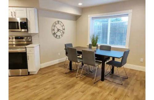 Highland Casa | Cheery and Bright four Bedroom Walkout Basement