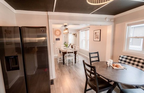 South Haven Casa | Cherry Door Cottage -Enclosed Backyard, Walk Downtown, Hot Tub!
