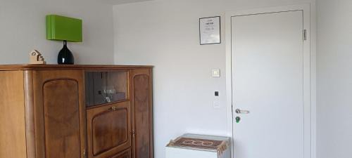 Courtepin Casa | Chez Elsa et Agou - chambre confortable chez l'habitant