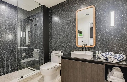 Rainey Street Historic District Hotel | Chic tower condo with city views in downtown Austin Texas. Pets Welcome