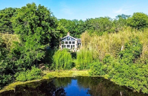 Mattituck Casa | Chic Mattituck waterfront home with beautiful views, slate patio, heated...