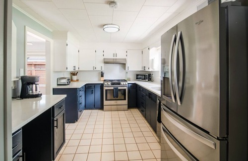 Traverse City Casa | Chic Modern Home: Private Yard & Hot Tub!