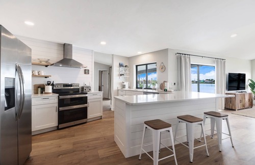 Eight Lakes Casa | Chic Remodel! Gulf-Access Waterfront! Heated Pool, Kayak, Bikes & Over $125 of Free Daily Activities
