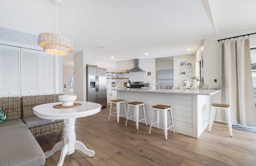 Eight Lakes Casa | Chic Remodel! Gulf-Access Waterfront! Heated Pool, Kayak, Bikes & Over $125 of Free Daily Activities
