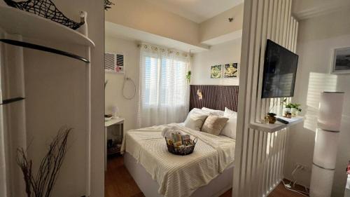 Santo Cristo Apartamento | Chic Retreat at Quezon City Grass Residences Condo