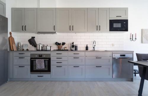Bastad Casa | Chocolaty Warmth Home 3BR Flat with Cozy Balcony