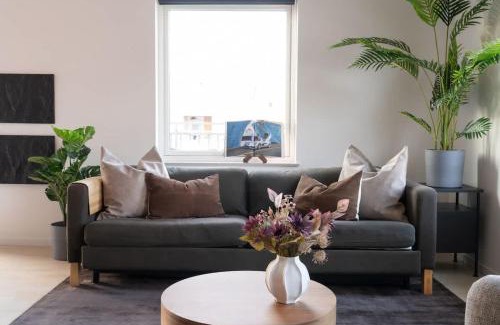 Bastad Casa | Chocolaty Warmth Home 3BR Flat with Cozy Balcony