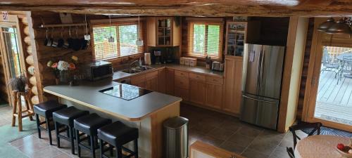 Kalispell Casa | Christy's Cottage, Waterfront w/Slide & Ice Shanty