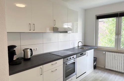 Frohnhausen Apartamento | City Apartment with WIFI, Kitchen and 4K TV