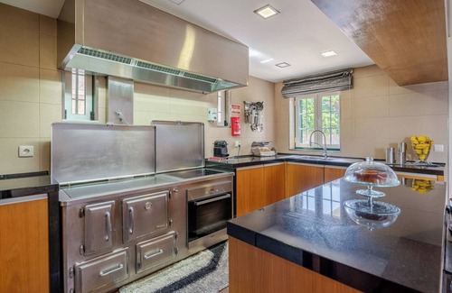 Paredes Casa | Classic Villa w/ Gym and Pool Access by HostWise