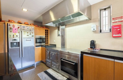 Paredes Casa | Classic Villa w/ Gym and Pool Access by HostWise