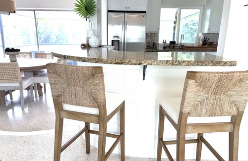 Hunt Club Casa | Clean Florida Coastal Design home with Heated Pool, Fireplace and Putt Putt