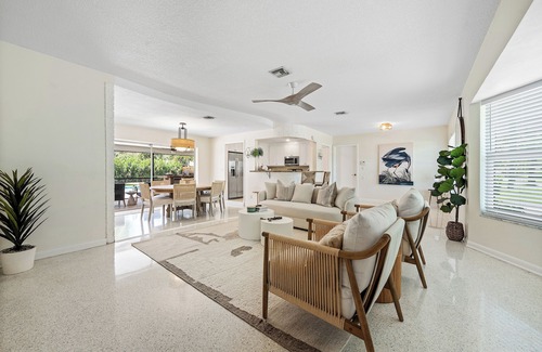Hunt Club Casa | Clean Florida Coastal Design home with Heated Pool, Fireplace and Putt Putt