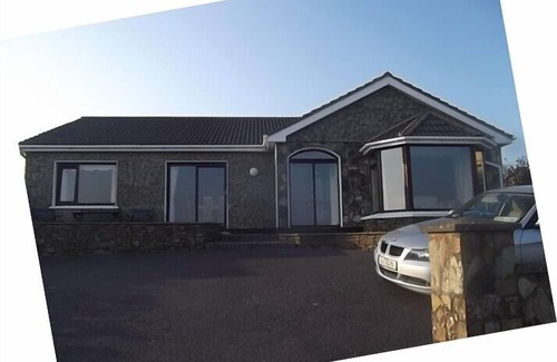 Inchydoney Casa | Clonakilty Inchydoney West Cork Precioso bungalow moderno con vistas a la playa