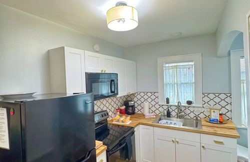 Historic Uptown Casa | Close to all with a King-bed! Bikes included