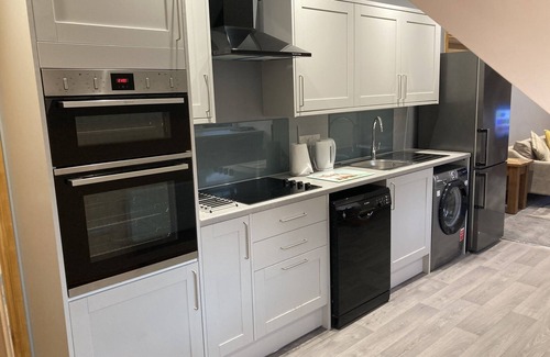 Grantham Apartamento | Apartamento-Ejecutivo-Baño con ducha-Vista al patio