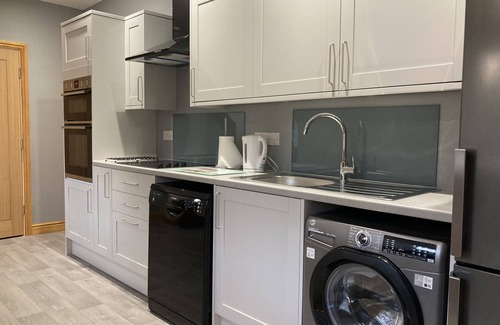 Grantham Apartamento | Apartamento-Ejecutivo-Baño con ducha-Vista al patio
