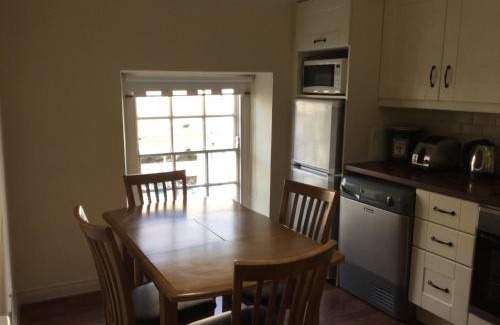 Armagh Apartamento | Coach house