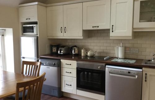 Armagh Apartamento | Coach house
