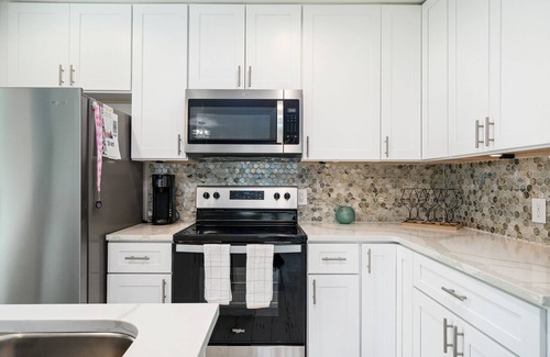 Key Allegro Condominio | Coastal Bliss | Private Boat Slip + Pool Access!