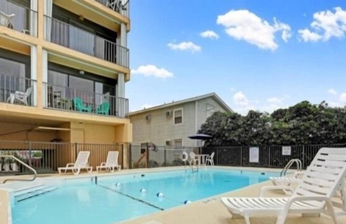 Carolina Beach Condominio | Coastal Cabana - Enjoy The Gorgeous Oceanfront Sunrise From Your 4th Floor Balcony. Walk To The Carolina Beach Boardwalk 2 Bedroom Condo by Redawning