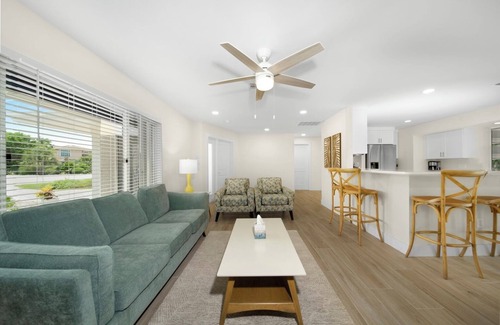 Shell Harbor Casa | Coastal Charm: Stunning Ground Level Pool Home on Canal with EastEnd Location