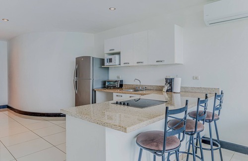 Puntarenas Condominio | Coastal condo with stunning sea views, rain shower & private balcony escape